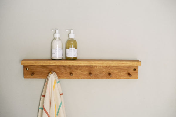 Oak shelf with pegs – Ilovani Furniture