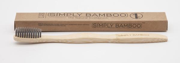 This is an adult-sized bamboo toothbrush, made with soft, biodegradable bristles infused with charcoal. 