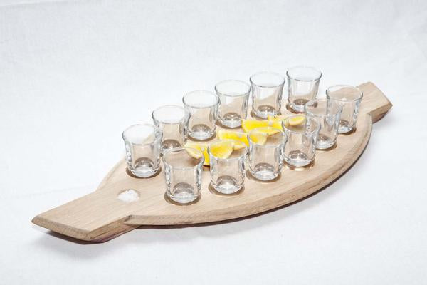 This is a shot tray made from reclaimed oak barrel tops. It can hold 12 shot glasses. 