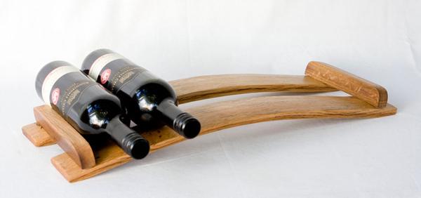 This is a wine barrel wine rack that compliments our furniture collection. It can hold 6 bottles.