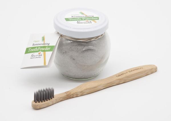 This is a bamboo toothbrush for kids with organic tooth powder. The toothbrush is made with biodegradable bristles. 