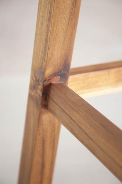 This is a close up of a bar stool detailing the solid blackwood design. The height of these breakfast and bar stools can be adjusted in the design. 