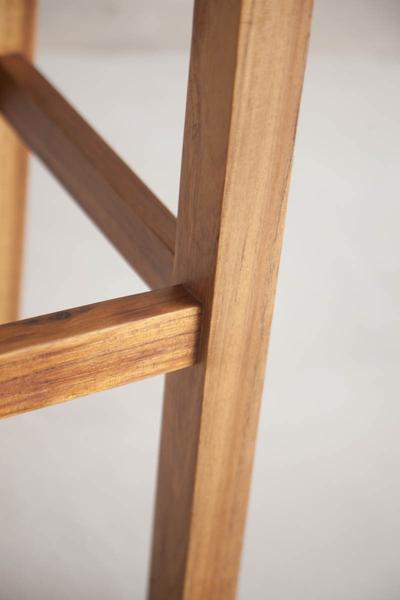 This is a close up of a bar stool leg made from blackwood. The height of these bar stools can be customised, so they can also be designed to be high bar chairs. 