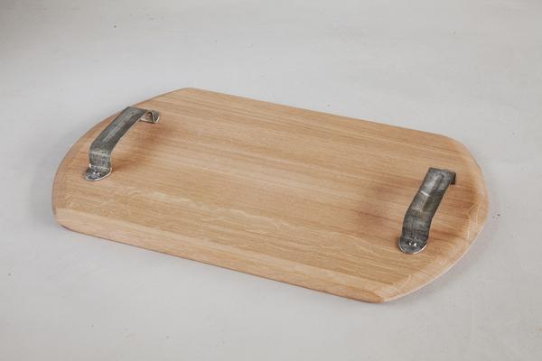 This is a wooden serving tray made from oak barrels. It has metal handles made from galvanised steel. 